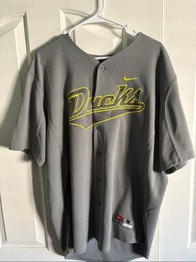 Nike Grey Men's Baseball Jersey with Yellow Script